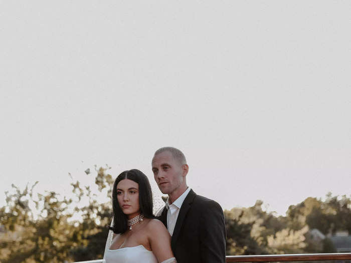 After the ceremony, Vora switched up her look by accessorizing the same dress with sheer gloves and a polka-dot veil. She also got her hair cut into a dramatic bob in between the ceremony and wedding photos.