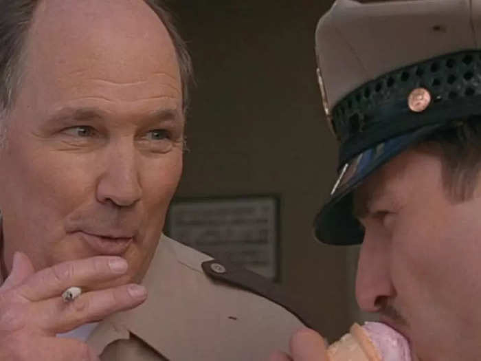 Dewey licks his ice-cream cone whenever Sheriff Burke smokes his cigarette.