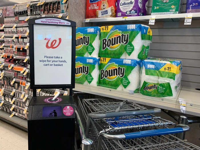 Upon entering the store, there was a small holding area for carts with sanitizing wipes to use on them.