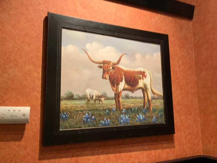 The hostess sat us at a corner table, right beneath a painting of yet another longhorn.