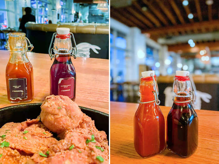 Two sauces — honey hot and bourbon maple syrup — to go with the chicken were already on the table.