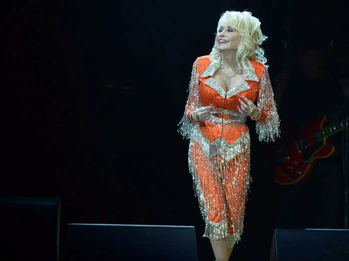 Parton dazzled in a highlighter-bright look for a 2014 benefit concert.