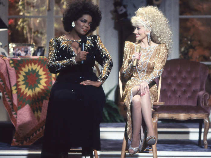 In what she later described as one of her favorite looks, Parton wore a shimmering gold gown alongside Oprah Winfrey for an episode of "Dolly."