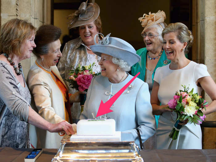 Jackson captured the moment the knife got stuck in the cake, causing the royals to burst out laughing.