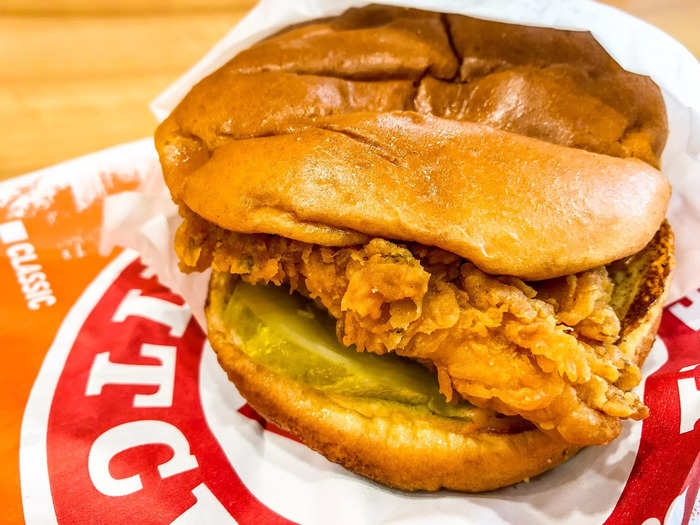 POPEYES: Spicy chicken sandwich, Cajun fries, biscuit, and a soft drink