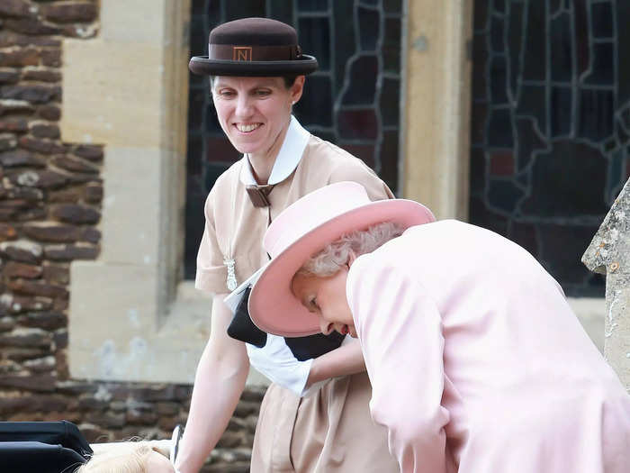 At the same event, Queen Elizabeth bent down to talk to her great-grandson.