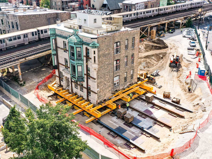 In August, the Chicago Transit Authority decided to move the three-story brick apartment building in order to "straighten and expand" the nearby train tracks.