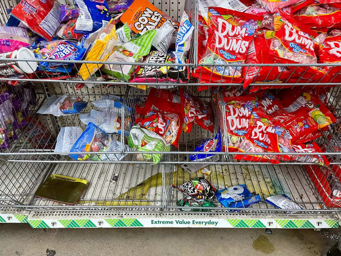 Packages of food had been opened and were spilling on to shelves.