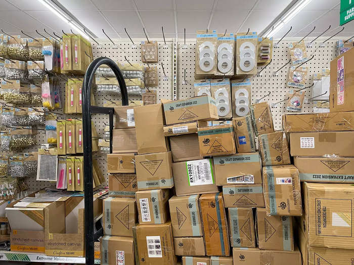 While employees seemed to be in the middle of restocking shelves, there was an overwhelming number of boxes piled up around the store.