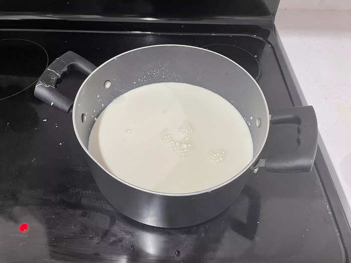 First, pour the milk into a pan and bring it to a boil.