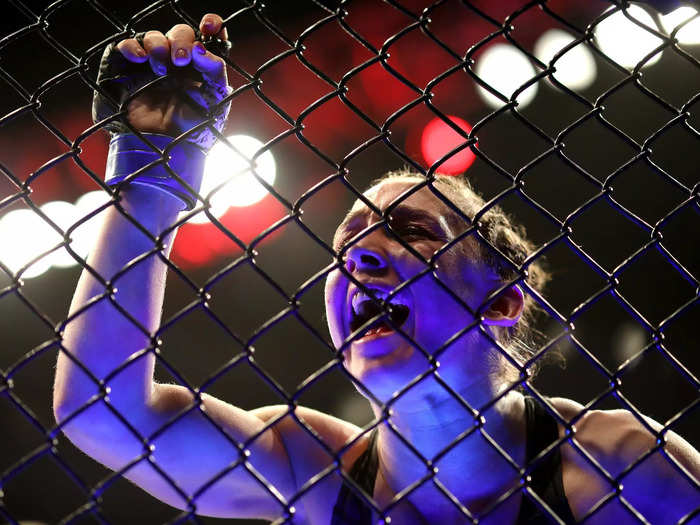 1/22: Vanessa Demopoulos celebrates after defeating Silvana Gomez Juarez by submission in their strawweight fight during UFC 270 in Anaheim, California.