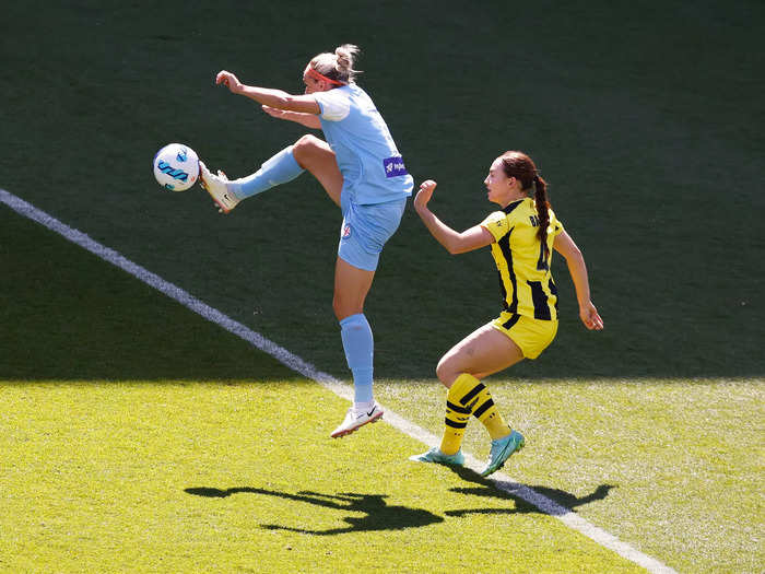 1/9: Melbourne City Hannah Wilkinson traps the ball during an A-League match against the Wellington Phoenix.