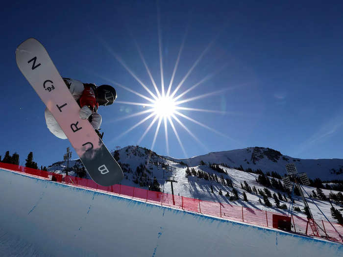 1/5: Xueton Cai of Team China takes a training run for the Snowboard Halfpipe competition at the Toyota U.S. Grand Prix at Mammoth Mountain in California.