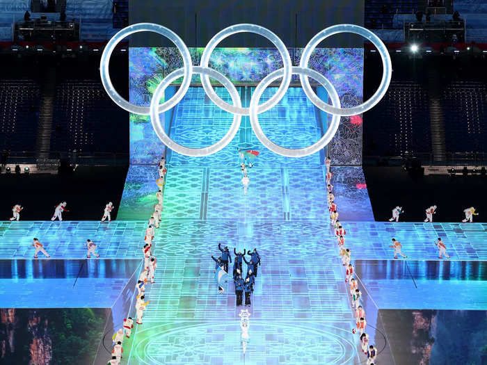 The famed Olympic rings then emerged from a virtual block of ice before rising above the stadium for all to see.