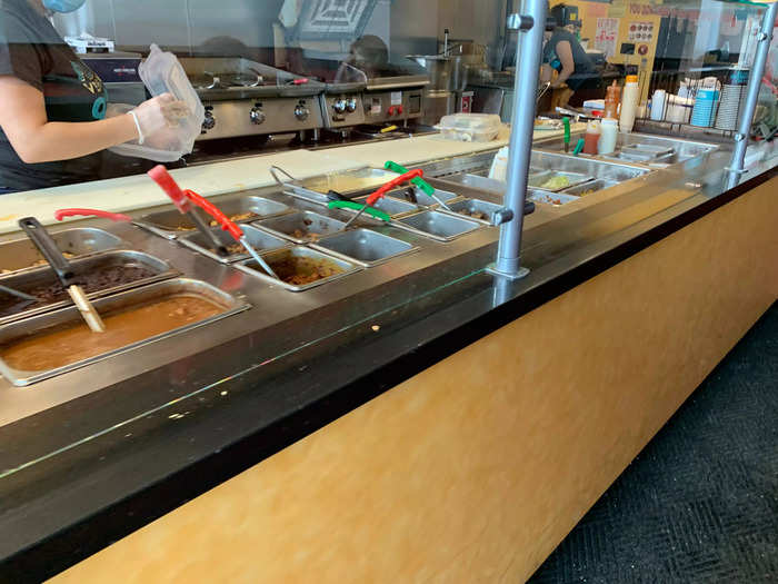 The counter where servers make the orders looked very similar to Chipotle, with containers of all the options behind glass where customers could see their choices.