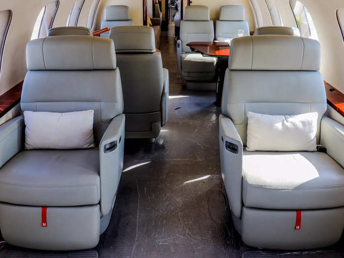 The layout is simple yet timeless with nearly every private jet aircraft featuring this type of seating area. Each club seat in the section is Bombardier