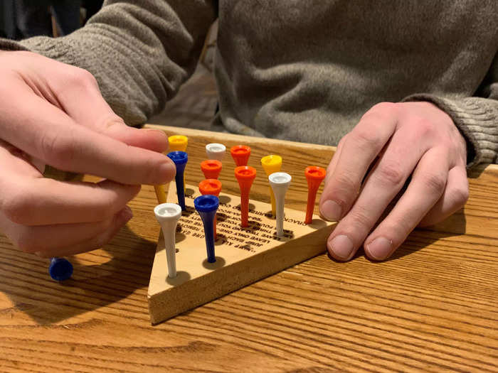 The game, which is simple to learn but tricky to beat, is so popular with customers that the chain sells it in the store and includes a virtual version in its app.