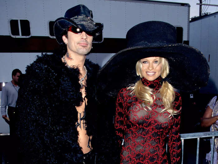 The actress arrived at the 1997 American Music Awards in an oversized hat and sheer red-and-black dress.