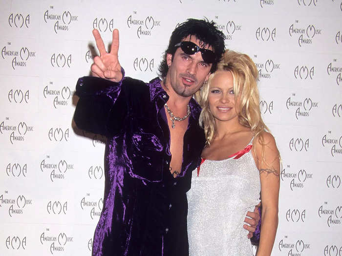 Anderson sparkled again in a silver minidress at the 1996 American Music Awards.