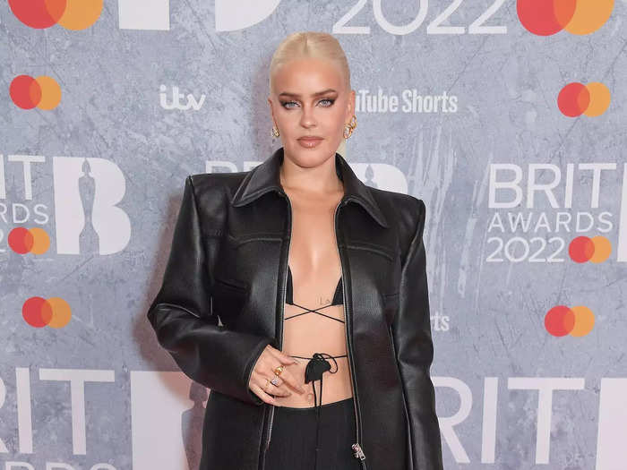 Singer Anne-Marie put her own twist on the "no-shirt" trend by wearing a black bikini top that tied around her torso.