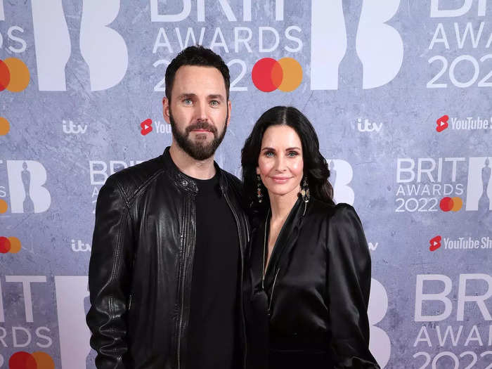 Johnny McDaid and Courtney Cox also chose all-black outfits for the Brit Awards.