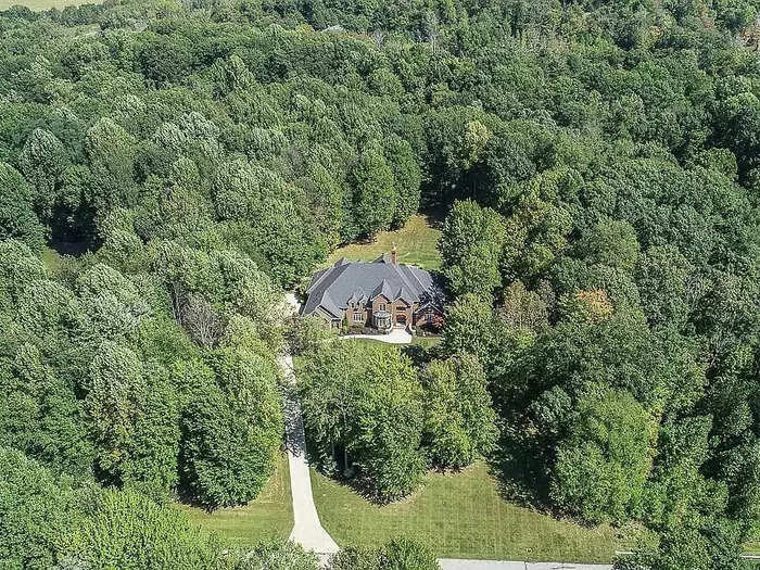 A mansion nestled in the woodlands of Kirtland Hills, Ohio, that