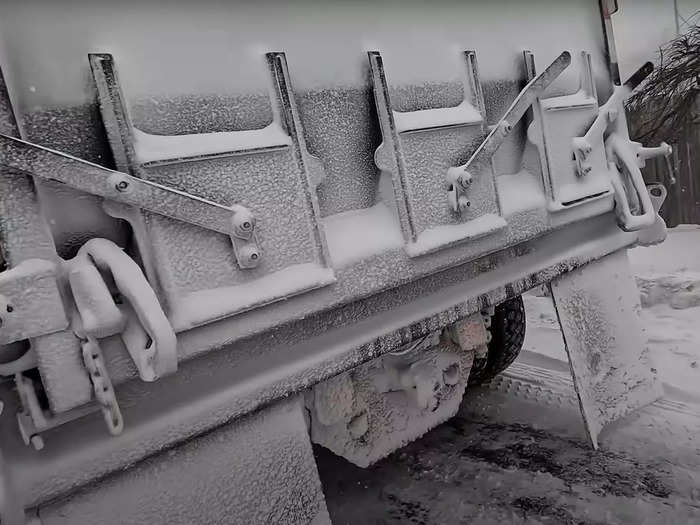 At a rest stop, Gaffin takes a walk around his truck to inspect it.