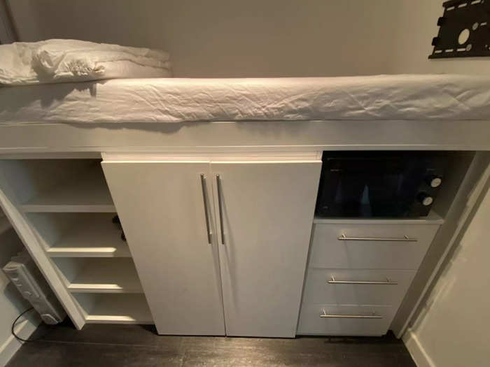 The most unusual aspect of the apartment is the lack of kitchen facilities, instead, the apartment offers a microwave underneath the mattress.