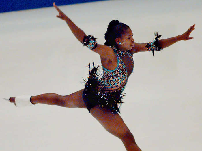 Surya Bonaly, the only Olympic figure skater to land a backflip on one blade, wore a costume decorated with fringe, as well as a plunging neckline and beads, in 1998.