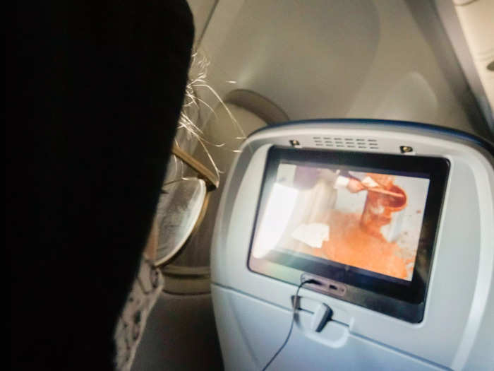 After meditating, I felt at peace with my temporary location in the sky and put on my favorite show, "The Office." I brought my old wired headphones for the flights, which the entertainment system required.