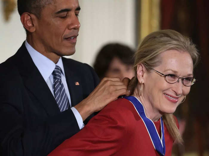 The following year, Meryl Streep wore a red dress with frog and bird-shaped brooches to accept the Presidential Medal of Freedom from Obama.