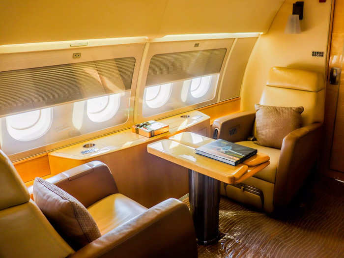 The first three living areas of the aircraft are dedicated to the principal flyers, starting with a small living room area.