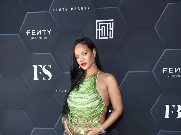 Rihanna showed off her baby bump with a chain-style top at a Fenty Beauty event in 2022.