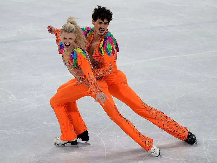 6. Canadians Piper Gilles and Paul Poirier rocked bright orange suits reminiscent of Elton John