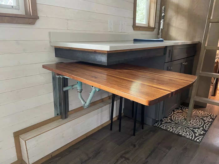 And across all the tiny homes, guests can find ingenious space-saving hacks like hidden tables and staircase storage.