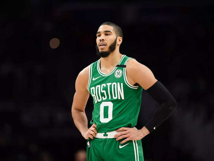 Jayson Tatum uses dumb bell squats to build muscle in his entire body