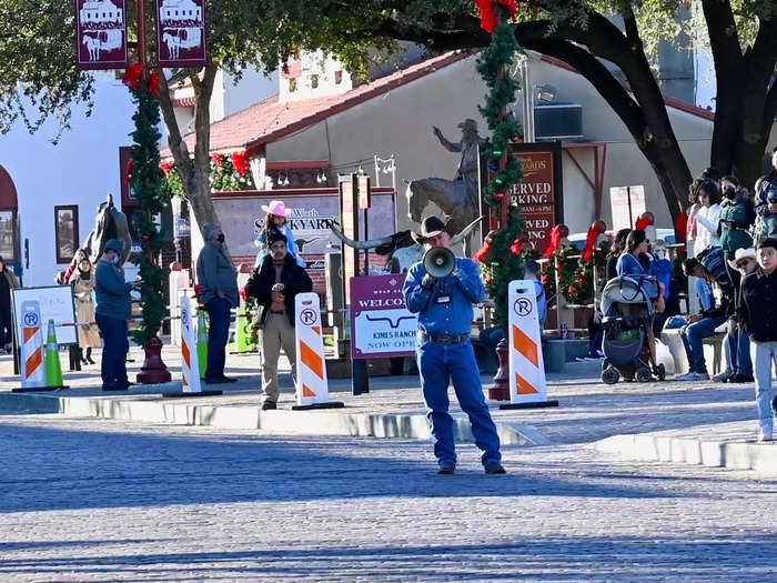 Before the cattle drive began, a person with a loudspeaker cleared the streets.