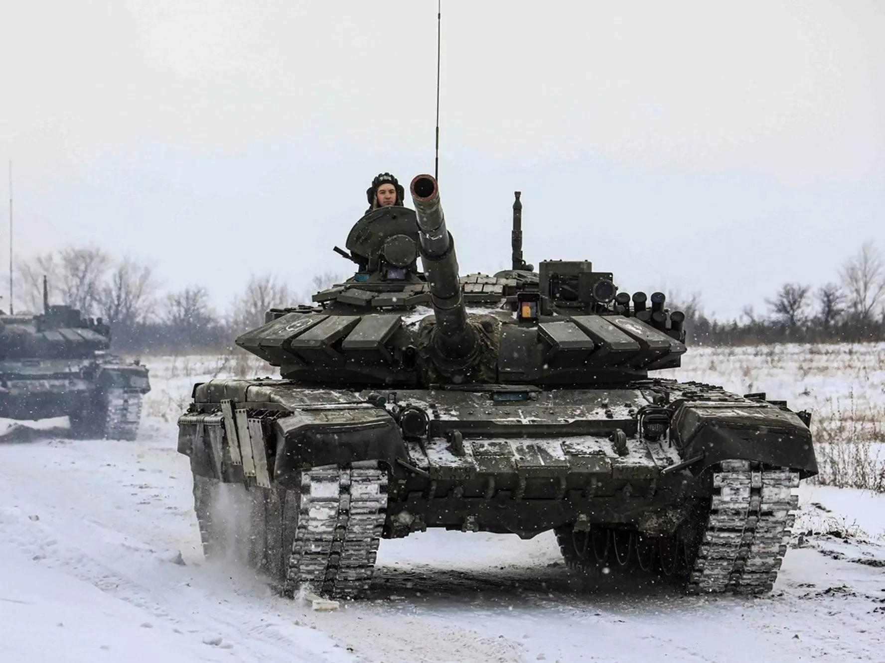 Russian tanks roll on the field in Leningrad, Russia.
