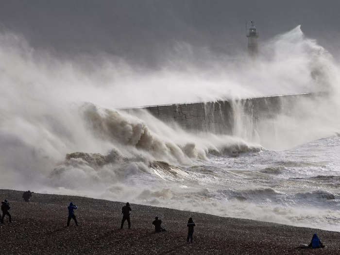 Storm Eunice hit the UK on Friday, causing extreme winds, train delays, and flight cancellations.