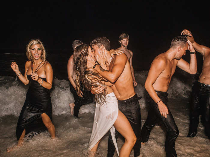 The couple was joined by 75 of their wedding guests in the water.