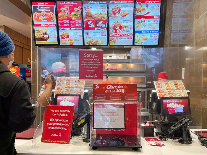 Like other fast-food chains, Jollibee had a sign at the cash register asking for patience as it deals with staffing shortages.