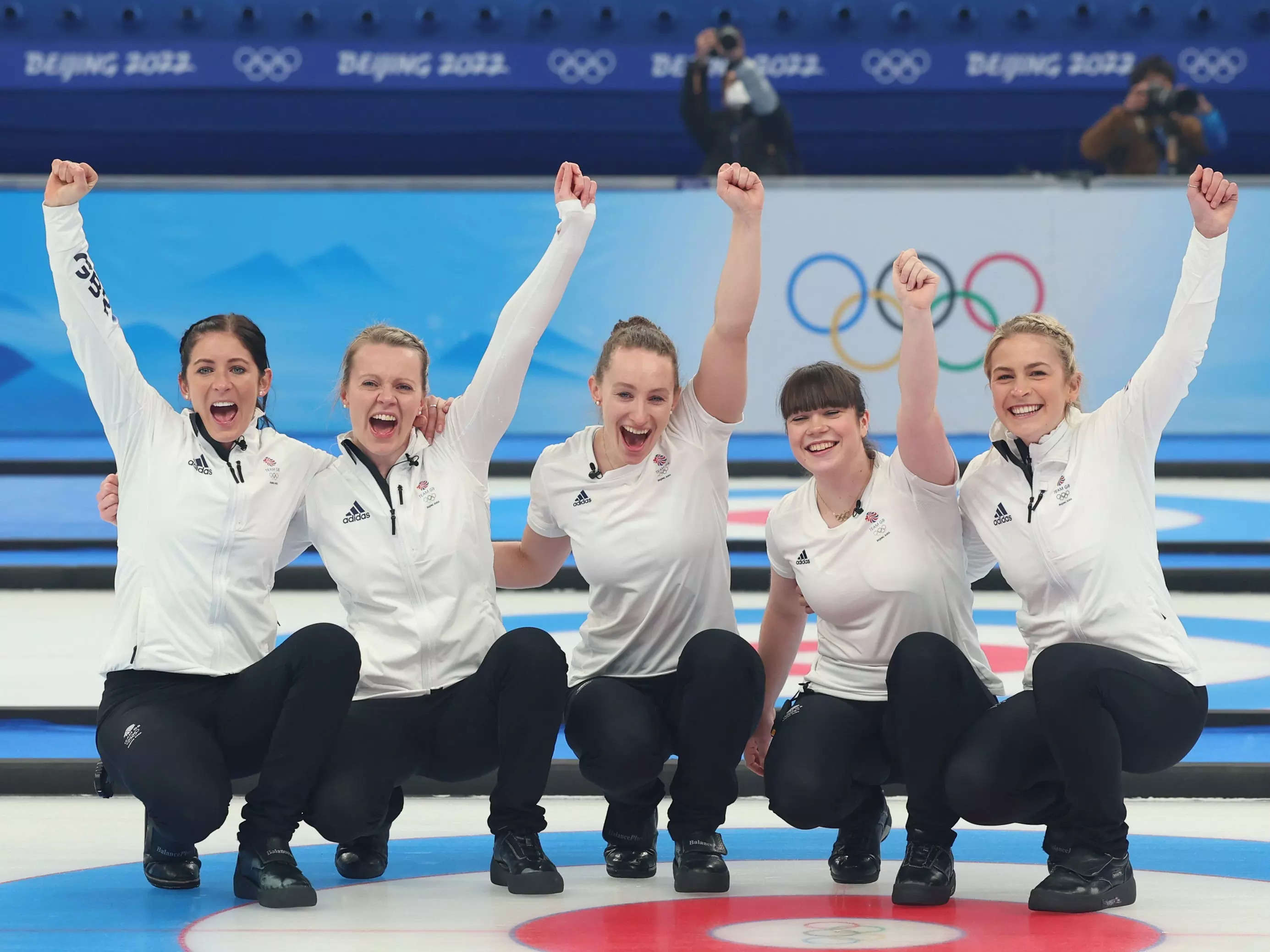 Team Great Britain celebrate after defeating Team Japan in the Women