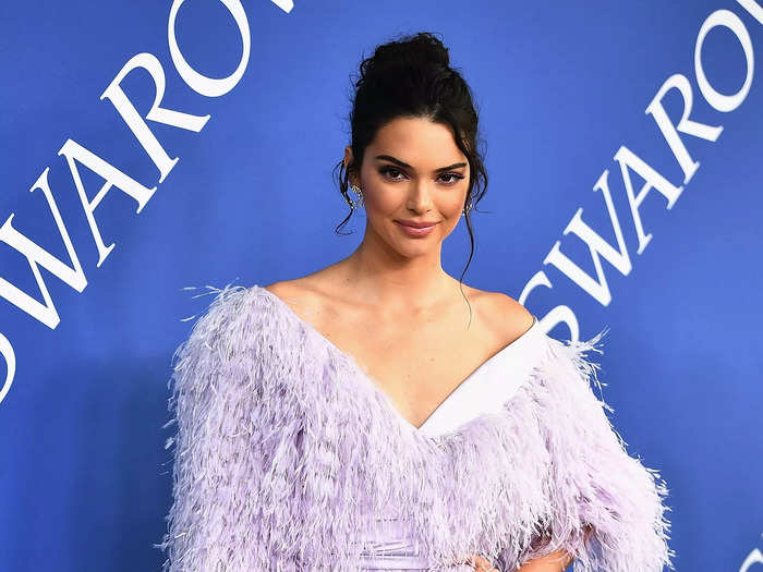 Jenner wore a lavender-colored dress bursting with feathers to attend the CFDA Awards in 2018.