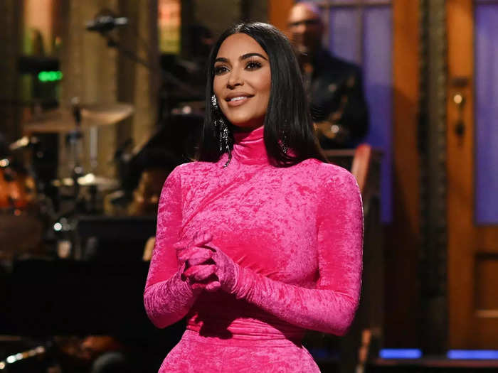 October 9, 2021: Kardashian hosted "SNL," joking about the divorce in her monologue and appearing in a sketch alongside Pete Davidson.