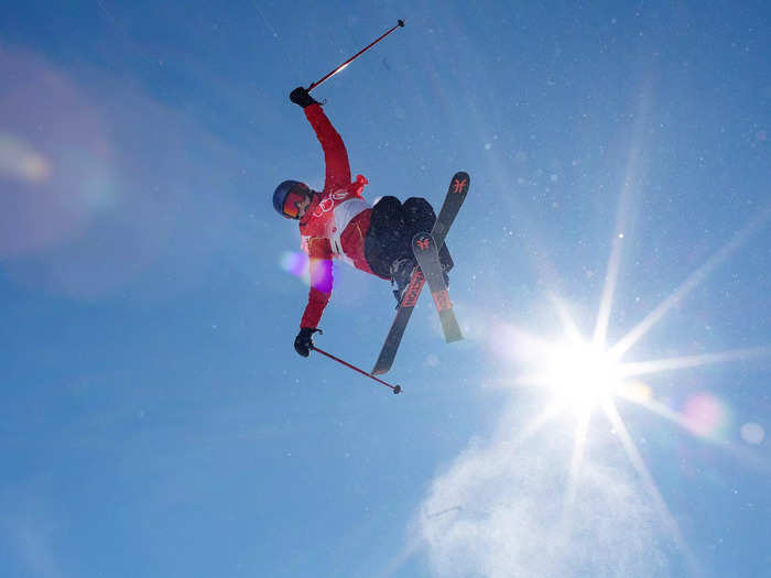 2/14: Eileen Gu performs a trick on another clear day during a Halfpipe training session on Day 10 of the Beijing Olympics.