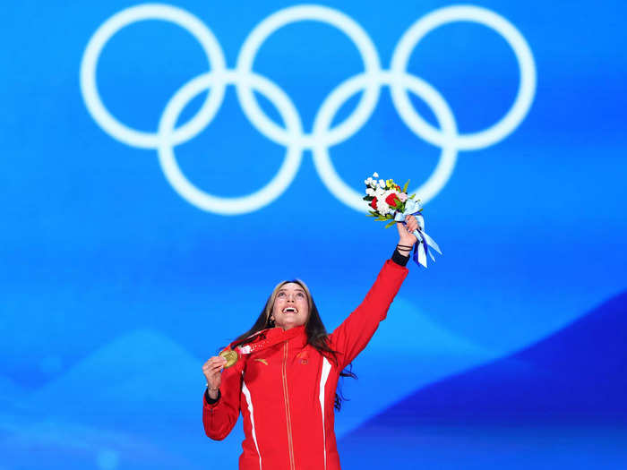 2/8: Eileen Gu poses with her gold medal during the Big Air medal ceremony on Day 4 of the Beijing Olympics.