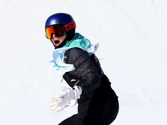 2/8: Eileen Gu reacts after landing a trick during her final run of the Big Air final to secure the gold and earn her first career Olympic medal.