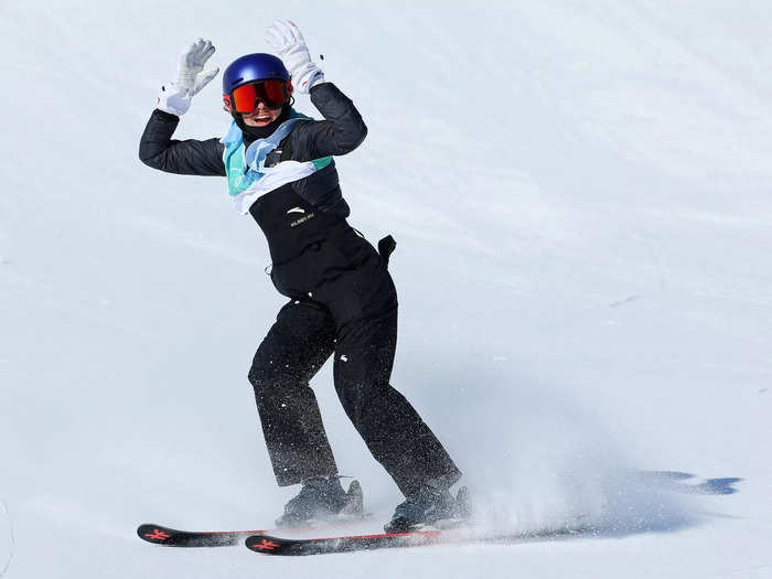 2/8: Eileen Gu celebrates after landing a trick during the Big Air final on Day 4 of the Beijing Olympics.