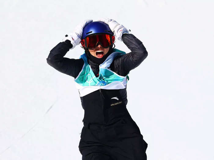 2/8: Eileen Gu reacts after pulling off a massive stunt during the Big Air final on Day 4 of the Olympics.