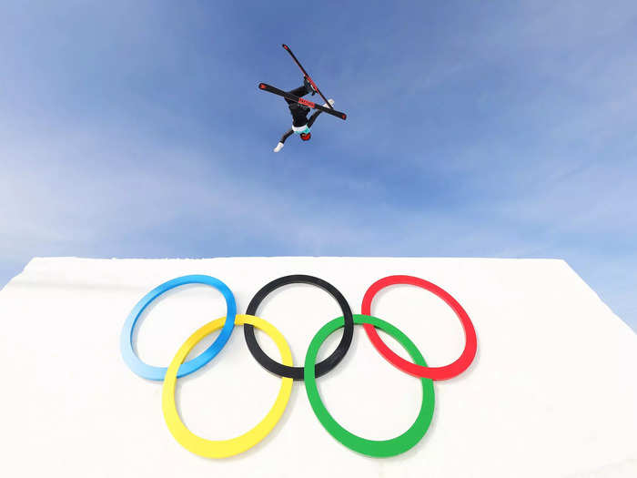 2/7: Eileen Gu launches over a jump while twisting into a trick during the Big Air qualification event on Day 3 of the Beijing Olympics.